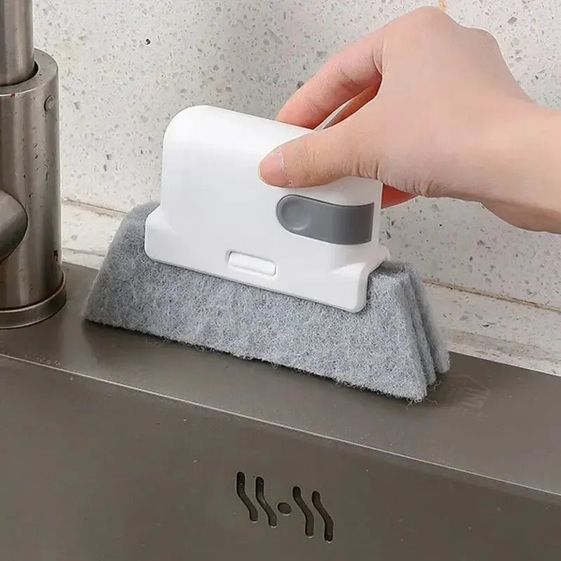 brosse netyoyage nettoie les angles au-dessus d'un lavabo