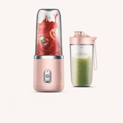 blender smoothie rose avec un liquide vert
