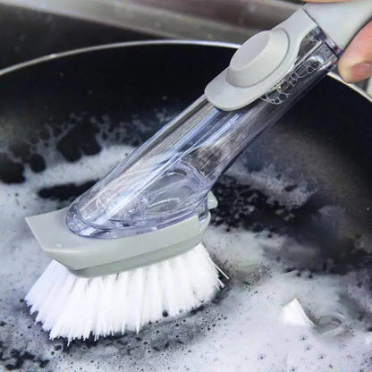 brosse-vaisselle-avec-reservoir-nettoyant-une-poele