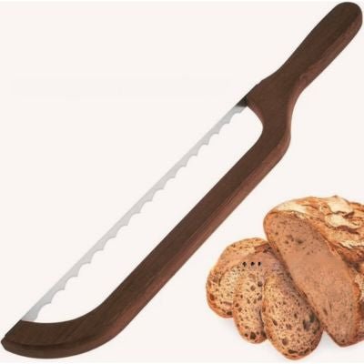 couteau à pain à côté de morceaux de pain tranchés