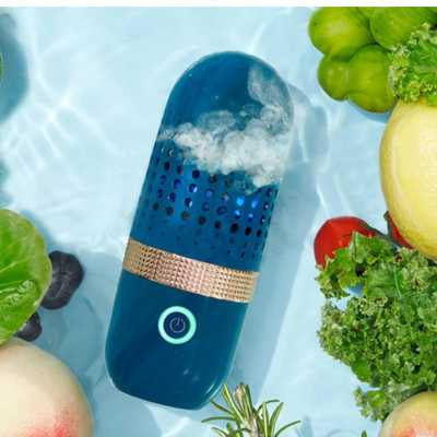 nettoyeur fruits et légumes effectue une purification matérialisée par de fines bulles,  de raisin, citrons, tomates, pêche, et romarin.