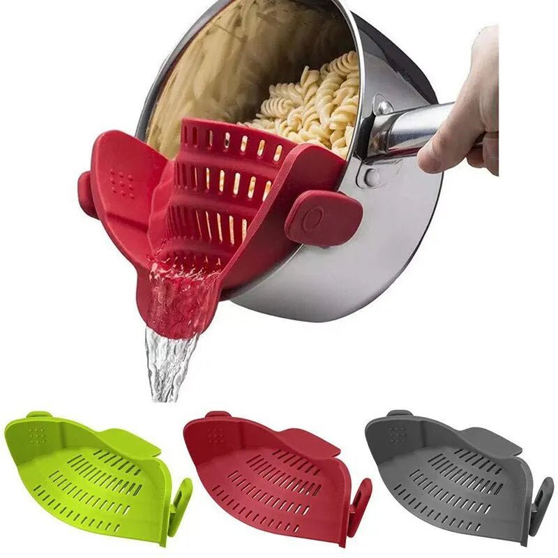 casserole-de-pates-verse-l-eau-au-travers-de-la-passoire-a-clipser-rouge