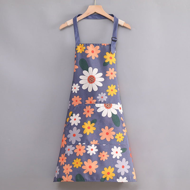 Tablier de cuisine fleuri bleu à motifs daisies multicolores, avec cordons réglables et poches.