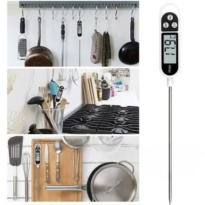 thermomètre de cuisson acroché avec divers ustensiles de cuisine